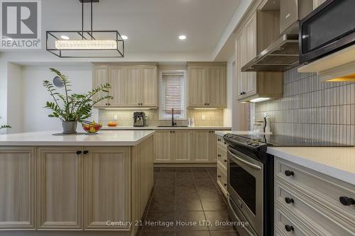 Updated hardware - lighting - 5 Juneberry Road, Thorold (Confederation Heights), ON - Indoor Photo Showing Kitchen With Upgraded Kitchen
