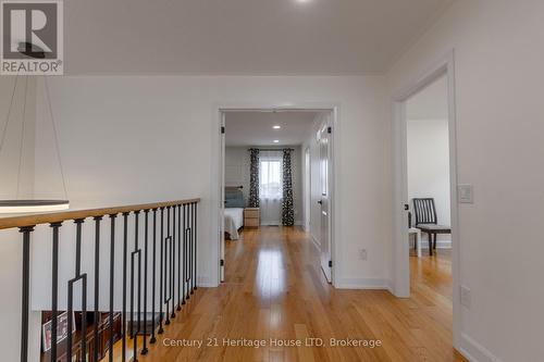 Double doors to primary bedroom - 5 Juneberry Road, Thorold (Confederation Heights), ON - Indoor Photo Showing Other Room