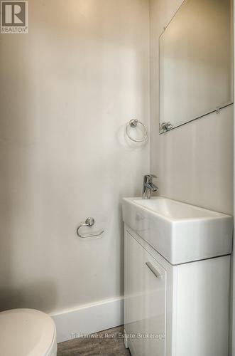 Unit A main floor 2 pc bath - 54 Park Street, Kitchener, ON - Indoor Photo Showing Bathroom