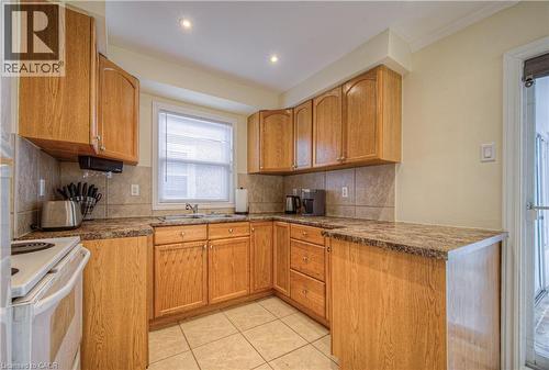 100 Reid Avenue S, Hamilton, ON - Indoor Photo Showing Kitchen With Double Sink