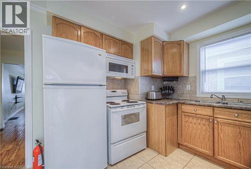 100 Reid Avenue S, Hamilton, ON - Indoor Photo Showing Kitchen With Double Sink