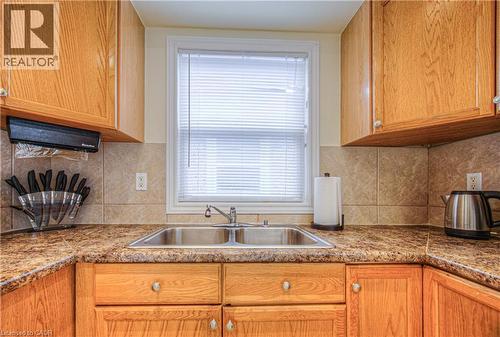 100 Reid Avenue S, Hamilton, ON - Indoor Photo Showing Kitchen With Double Sink