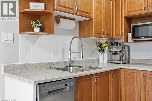 914 Mohawk Road E Unit# 7, Hamilton, ON - Indoor Photo Showing Kitchen With Double Sink