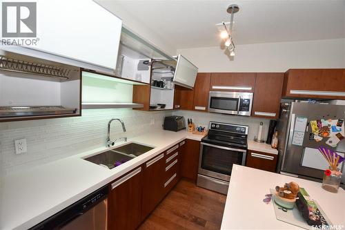 204 2315 Mcclocklin Road, Saskatoon, SK - Indoor Photo Showing Kitchen With Double Sink