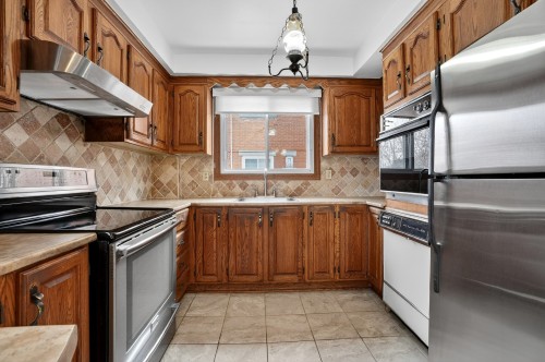 Cuisine - 980 100E Avenue, Laval (Chomedey), QC - Indoor Photo Showing Kitchen