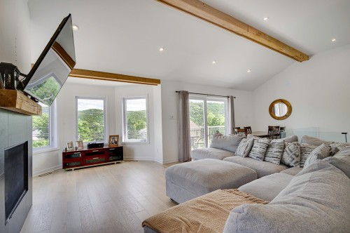 Salon - 511 Rue Principale, Saint-Sauveur, QC - Indoor Photo Showing Living Room With Fireplace