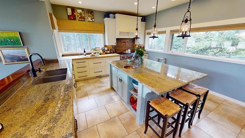 8875 Colony Road, Wardner, BC - Indoor Photo Showing Kitchen With Double Sink
