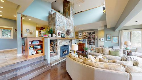8875 Colony Road, Wardner, BC - Indoor Photo Showing Living Room With Fireplace