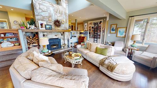 8875 Colony Road, Wardner, BC - Indoor Photo Showing Living Room With Fireplace