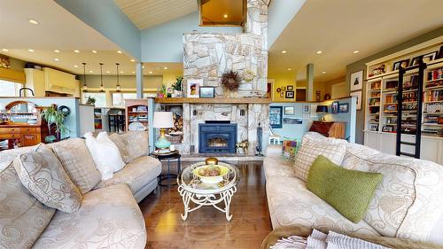 8875 Colony Road, Wardner, BC - Indoor Photo Showing Living Room With Fireplace