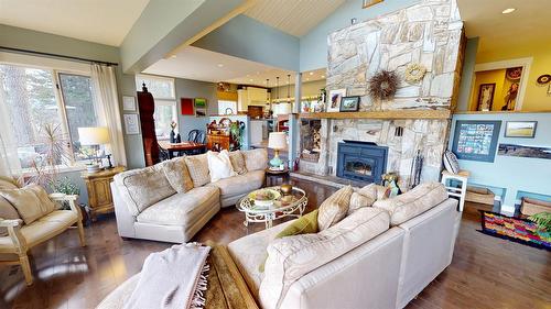 8875 Colony Road, Wardner, BC - Indoor Photo Showing Living Room With Fireplace