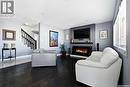 130 E Maple Avenue, Grand Coulee, SK  - Indoor Photo Showing Living Room With Fireplace 