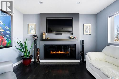 130 E Maple Avenue, Grand Coulee, SK - Indoor Photo Showing Living Room With Fireplace