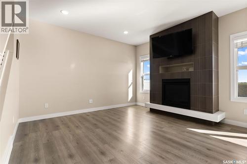 3523 Green Turtle Road, Regina, SK - Indoor Photo Showing Other Room With Fireplace