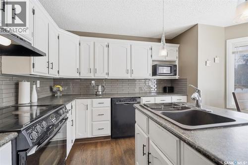 506 Addie Crescent, Saskatoon, SK - Indoor Photo Showing Kitchen With Double Sink