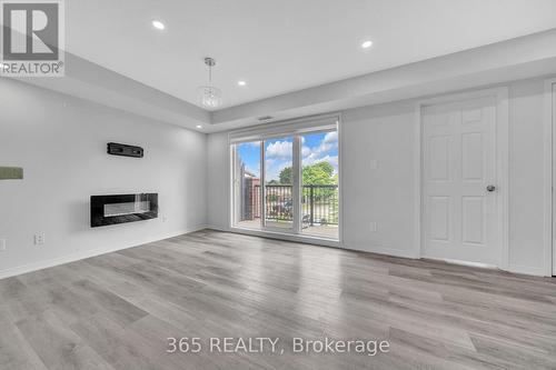 4D - 45 Cedarhill Crescent, Kitchener, ON - Indoor Photo Showing Living Room With Fireplace