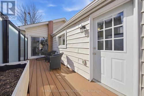 back deck with Trex decking and privacy screen - 36 Queensdale Avenue W, Hamilton, ON - Outdoor With Exterior