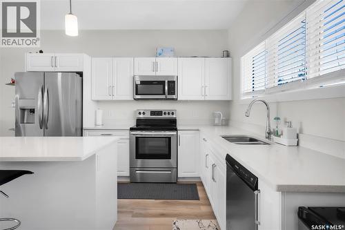 170 East Hampton Boulevard, Saskatoon, SK - Indoor Photo Showing Kitchen With Stainless Steel Kitchen With Double Sink With Upgraded Kitchen