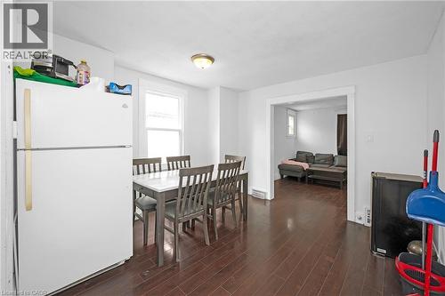 Dining space featuring dark wood-style flooring - 43 Sterling Street, Hamilton, ON - Indoor Photo Showing Dining Room