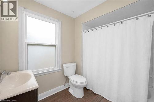 Bathroom featuring vanity and dark wood finished floors - 43 Sterling Street, Hamilton, ON - Indoor Photo Showing Bathroom