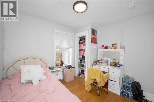 Bedroom featuring light wood-type flooring and a closet - 43 Sterling Street, Hamilton, ON - Indoor Photo Showing Bedroom