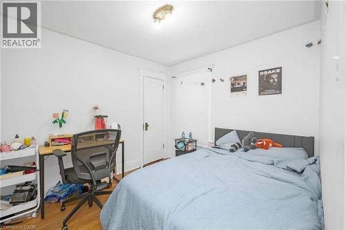 Bedroom featuring light wood-type flooring - 43 Sterling Street, Hamilton, ON - Indoor Photo Showing Bedroom