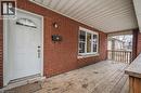 Entrance to property with brick siding and covered porch - 43 Sterling Street, Hamilton, ON  - Outdoor With Exterior 