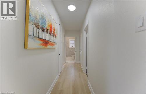 Hallway featuring baseboards and light wood-type flooring - 171 Sixth Avenue, Kitchener, ON - Indoor Photo Showing Other Room