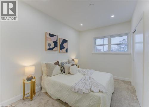 Bedroom with light colored carpet and recessed lighting - 171 Sixth Avenue, Kitchener, ON - Indoor Photo Showing Bedroom