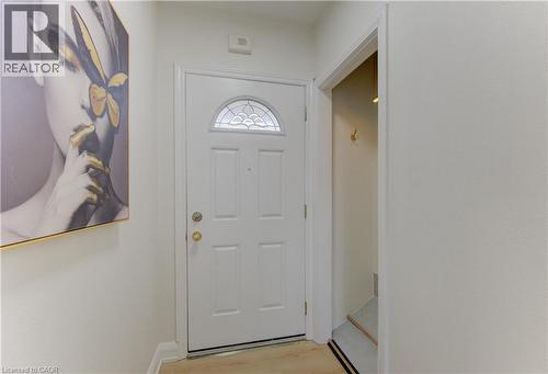 Doorway featuring wood finished floors - 171 Sixth Avenue, Kitchener, ON - Indoor Photo Showing Other Room