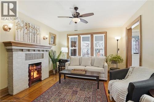 223 Park Row S, Hamilton, ON - Indoor Photo Showing Living Room With Fireplace