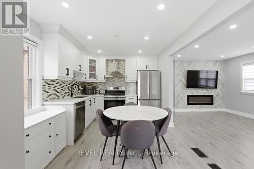 44 Jefferson Avenue, Hamilton, ON - Indoor Photo Showing Kitchen With Fireplace With Upgraded Kitchen