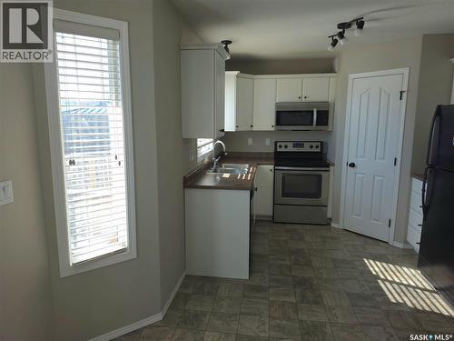 2955 Mcclocklin Road, Saskatoon, SK - Indoor Photo Showing Kitchen With Double Sink