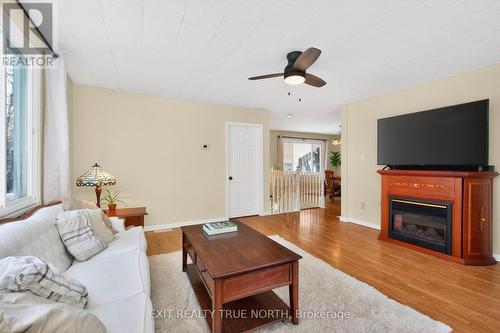 8 Robin Court, Tiny, ON - Indoor Photo Showing Living Room With Fireplace