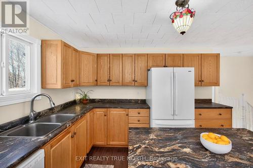 8 Robin Court, Tiny, ON - Indoor Photo Showing Kitchen With Double Sink