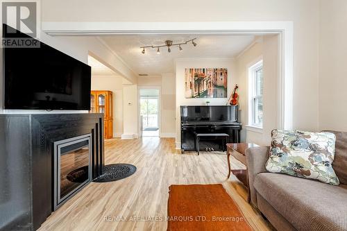 323 8Th Street E, Cornwall, ON - Indoor Photo Showing Living Room With Fireplace
