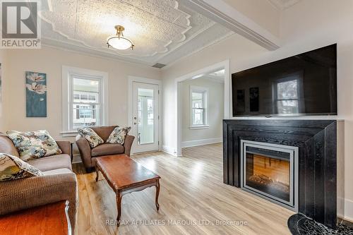 323 Eighth Street E, Cornwall, ON - Indoor Photo Showing Living Room With Fireplace