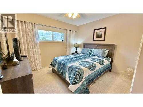 461 Eighth Avenue, Midway, BC - Indoor Photo Showing Bedroom
