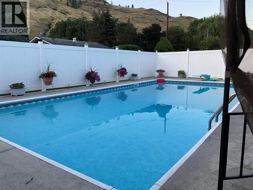 461 Eighth Avenue, Midway, BC - Outdoor With In Ground Pool With Backyard