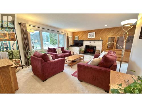 461 Eighth Avenue, Midway, BC - Indoor Photo Showing Living Room With Fireplace