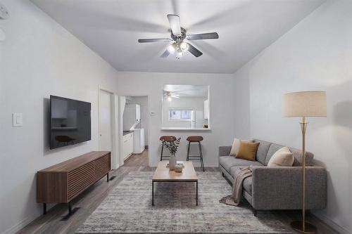 Virtually staged for design and layout inspiration. - 401 Union Avenue W, Winnipeg, MB - Indoor Photo Showing Living Room