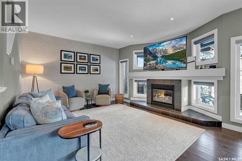 8856 Kestral Drive, Regina, SK - Indoor Photo Showing Living Room With Fireplace