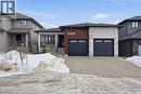 4418 Sage Crescent E, Regina, SK  - Outdoor With Facade 
