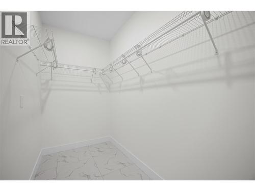 7279 Birch Close, Anglemont, BC - Indoor With Storage