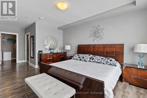 Primary - 411 - 260 Villagewalk Boulevard, London North (North R), ON - Indoor Photo Showing Bedroom