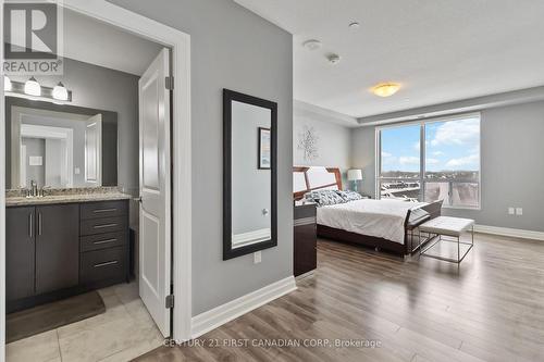 Primary - 411 - 260 Villagewalk Boulevard, London North (North R), ON - Indoor Photo Showing Bedroom