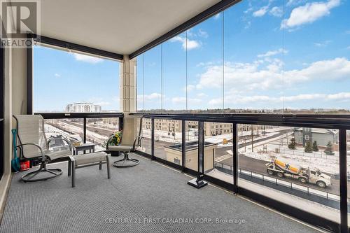 Enclosed balcony - NW facing - glass panels - 411 - 260 Villagewalk Boulevard, London North (North R), ON - Outdoor With Balcony With Exterior