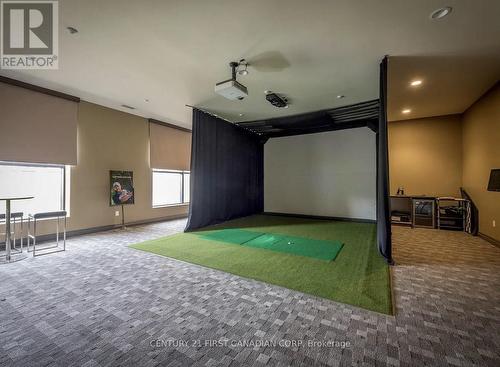 Indoor golf simulator - 411 - 260 Villagewalk Boulevard, London North (North R), ON - Indoor Photo Showing Other Room