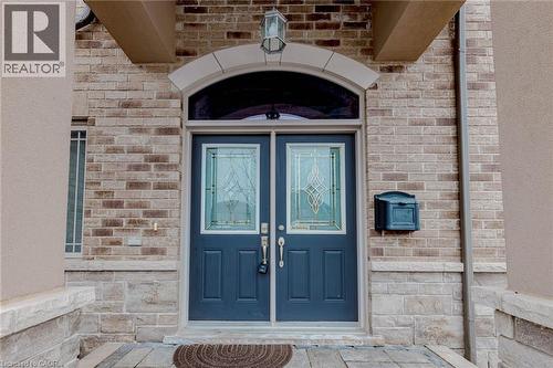 View of exterior entry featuring brick siding - 2 Doon Creek Street, Kitchener, ON - Outdoor With Exterior