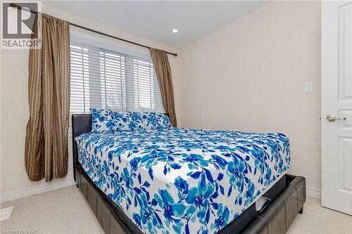 Bedroom featuring light colored carpet - 2 Doon Creek Street, Kitchener, ON - Indoor Photo Showing Bedroom